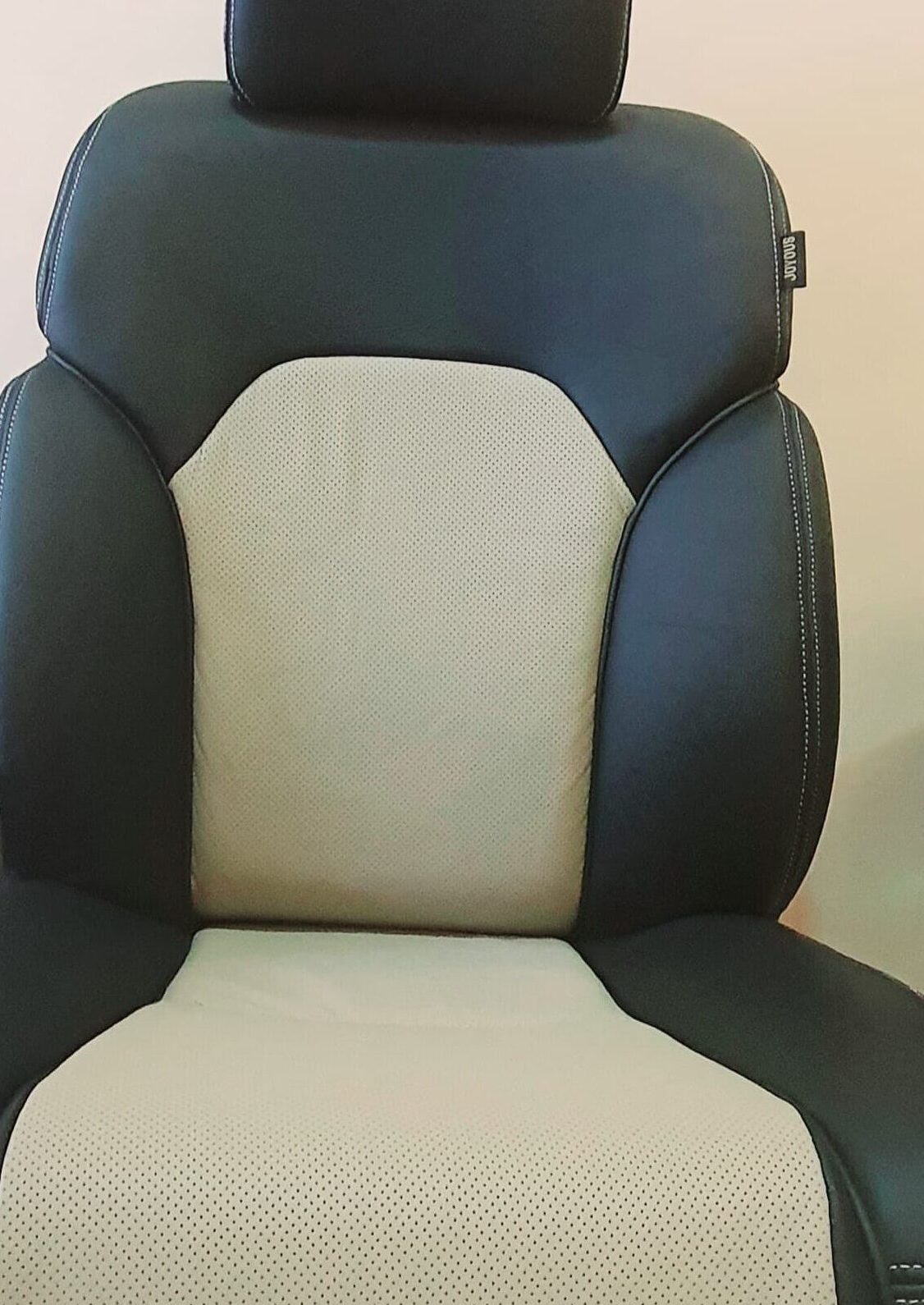 image showing black and beige car seat covers by denali automotive leather, best car seat covers in pakistan, car poshish near you